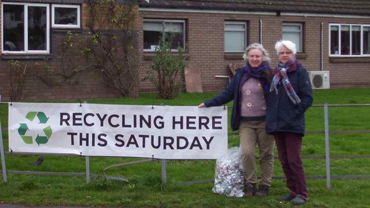 Ewyas Harold recycling Saturday banner with supporters