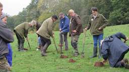 Group from Herefordshire Meadows working on meadow land
