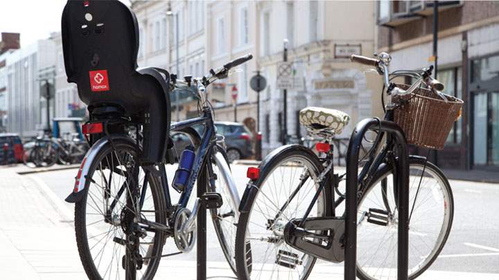 Bicycles locked up to cycle stands