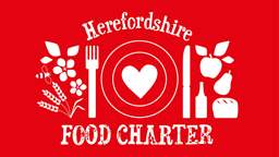 White on red Herefordshire Food Charter logo