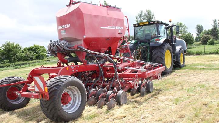 Farm machinery at work in a Herefordshire field