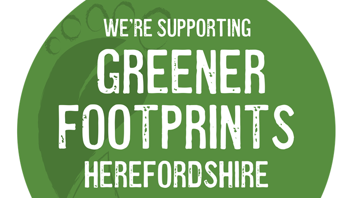 green background with white text saying we're supporting greener footprints Herefordshire