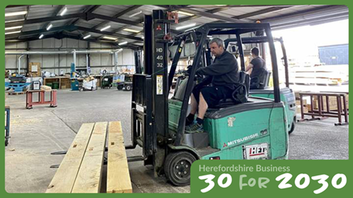 Fork lift lifting few woods